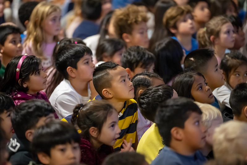 Students watching space presentation
